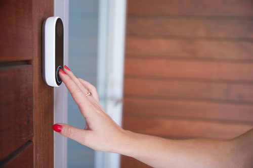 video doorbell being pressed